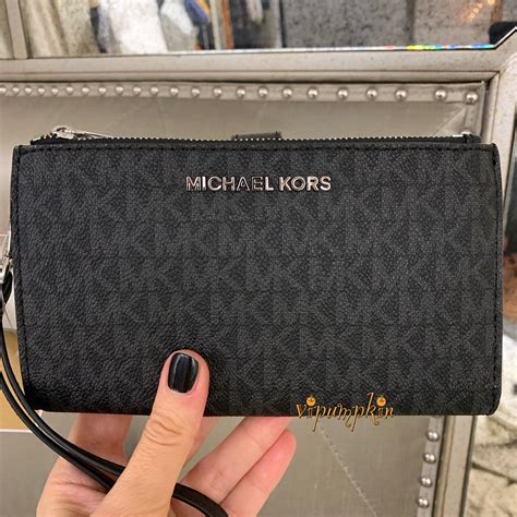 michael kors jet set travel large pvc wristlet black|Jet Set Travel Large Logo Continental Wristlet .